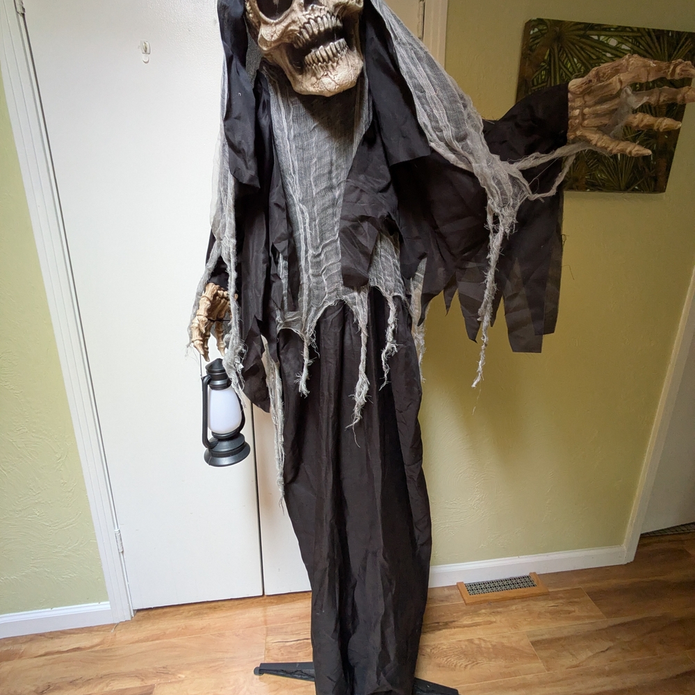 Haunting Hill Farm Animatronic Skeleton Reaper with Lantern Halloween Decor